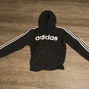 Black Adidas hoodie used is slightly turned in some areas. Not very noticeable.